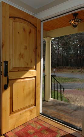Wood door installed by Homepride Inc. Bedford, MA